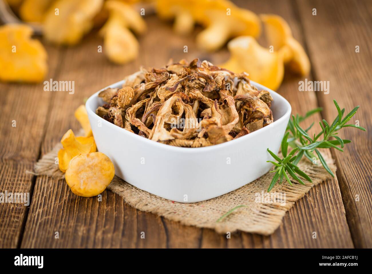 Fresh made Dried Chanterelles on a vintage background as detailed close