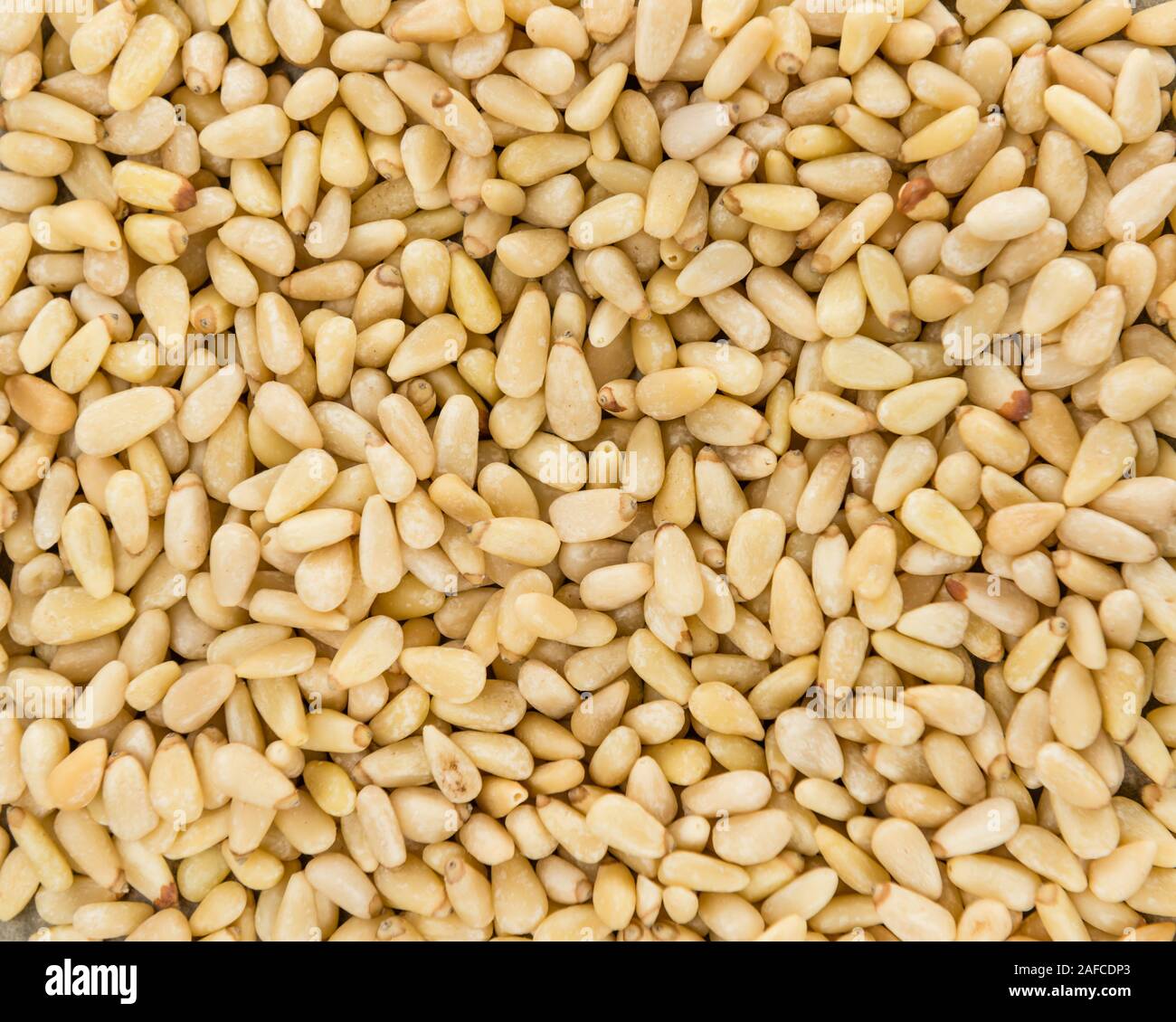 Pine Nuts close-up shot for use as background image or as texture Stock Photo