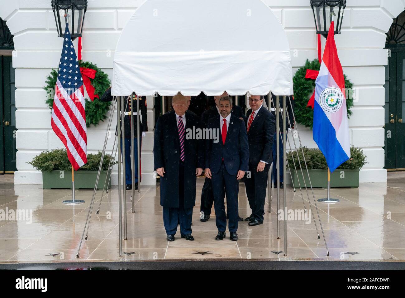 Washington, United States Of America. 13th Dec, 2019. President Donald J. Trump poses for a photo with Paraguay President Mario Abdo Benitez Friday, Dec. 13, 2019, at the South Portico of the White House People: President Donald J. Trump, Paraguay President Mario Abdo Benitez Credit: Storms Media Group/Alamy Live News Stock Photo
