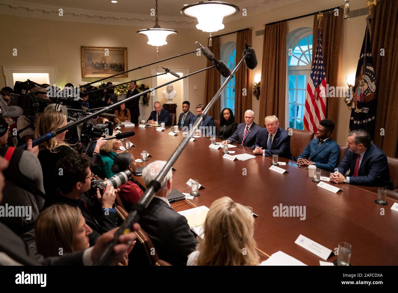 Washington, United States Of America. 09th Dec, 2019. President Donald J. Trump, joined by Vice President Mike Pence, delivers remarks at a roundtable on empowering families with education choice Monday, Dec. 9, 2019, in the Cabinet Room of the White House. People: President Donald Trump Credit: Storms Media Group/Alamy Live News Stock Photo