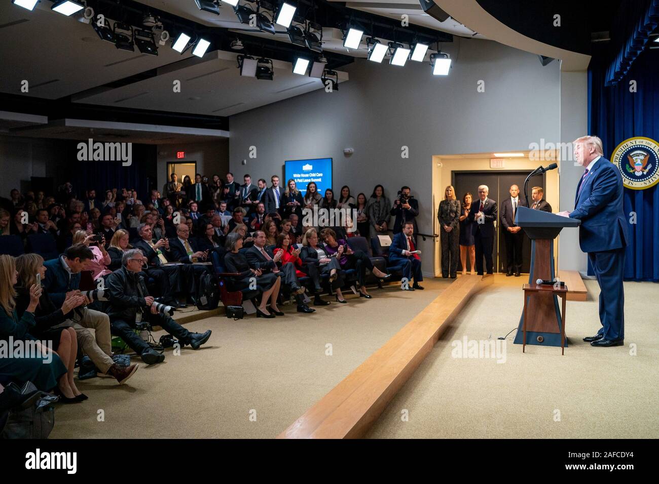 Washington, United States Of America. 12th Dec, 2019. President Donald J. Trump delivers remarks at the White House Summit on Child Care and Paid Leave: Supporting AmericaÕs Working Families Thursday, Dec. 12, 2019, in the South Court Auditorium of the Eisenhower Executive Office Building of the White House. People: President Donald J. Trump Credit: Storms Media Group/Alamy Live News Stock Photo