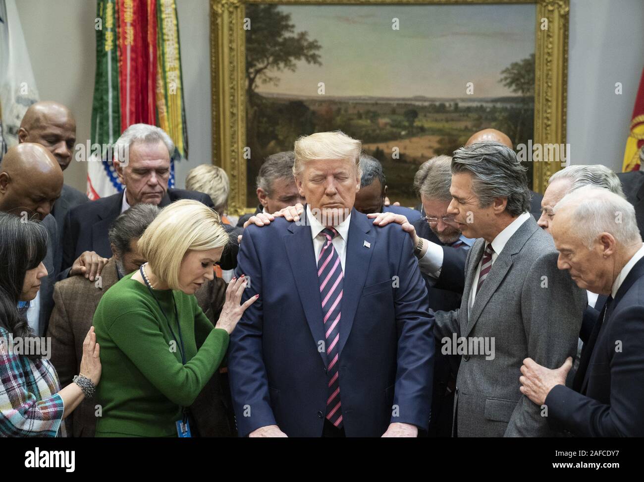 Washington, United States Of America. 12th Dec, 2019. President Donald J. Trump joins faith leaders in prayer Thursday, Dec. 12, 2019, during a meeting in the Roosevelt Room of the White House People: President Donald J. Trump Credit: Storms Media Group/Alamy Live News Stock Photo