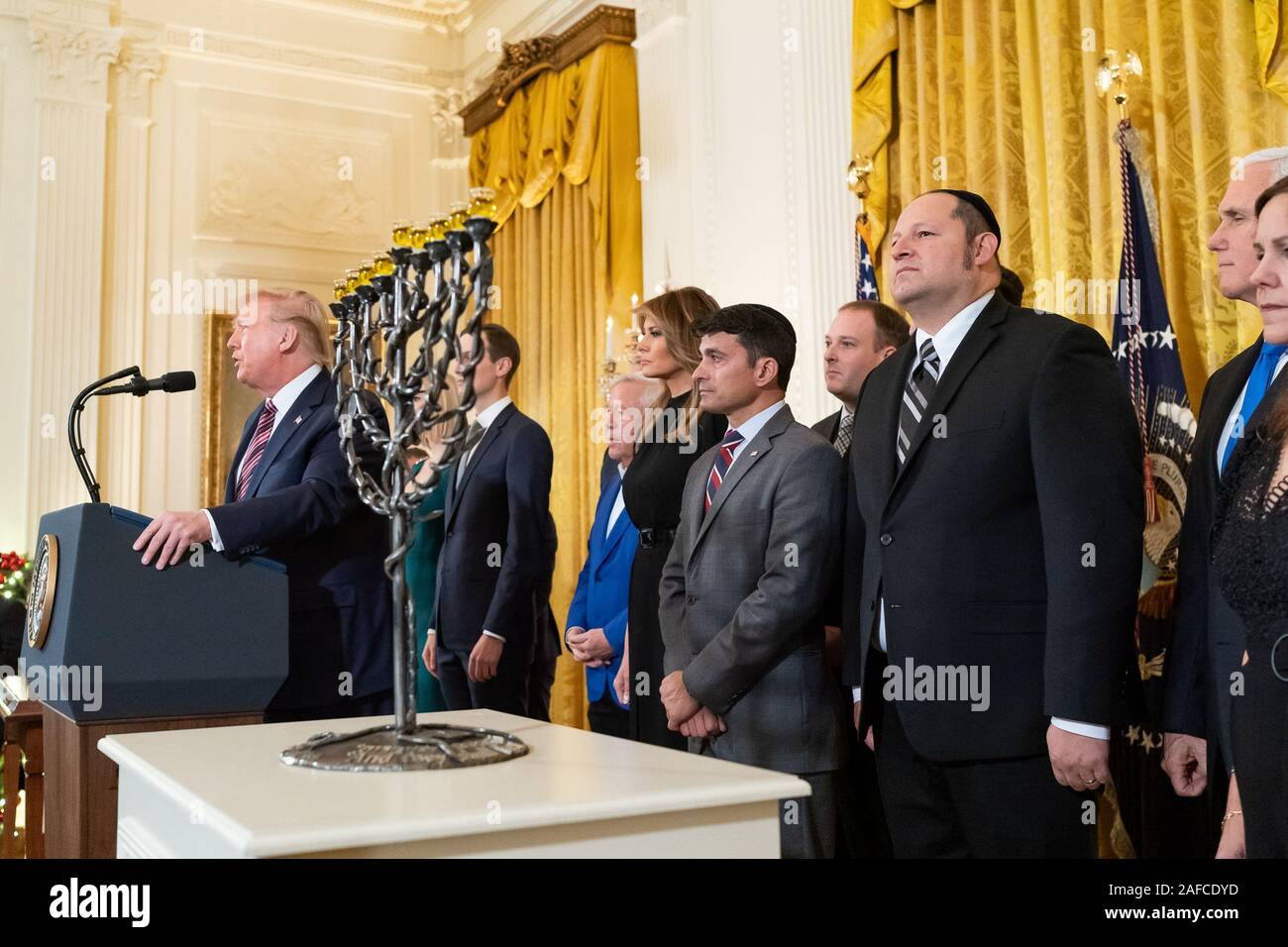 Washington, United States Of America. 11th Dec, 2019. President Donald J. Trump, joined by First Lady Melania Trump, delivers remarks at a Hanukkah Reception Wednesday, Dec. 11, 2019, in the East Room of the White House. People: President Donald J. Trump, First Lady Melania Trump Credit: Storms Media Group/Alamy Live News Stock Photo