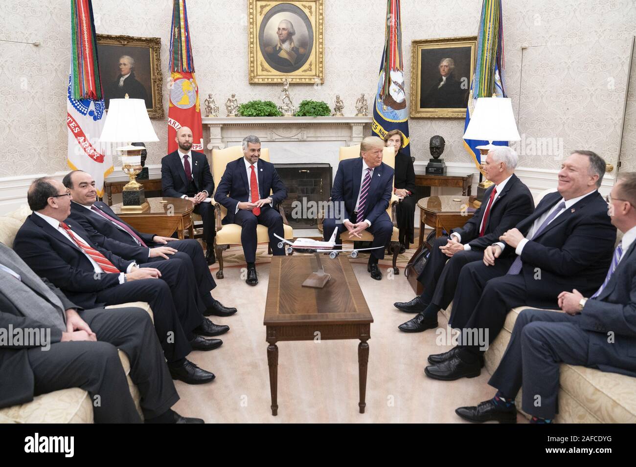 Washington, United States Of America. 13th Dec, 2019. President Donald J. Trump and Vice President Mike Pence, joined by White House senior advisors, participates in an expanded bilateral meeting with Paraguay President Mario Abdo Benitez Friday, Dec. 13, 2019, in the Oval Office of the White House People: President Donald J. Trump, Mario Abdo Benitez Credit: Storms Media Group/Alamy Live News Stock Photo