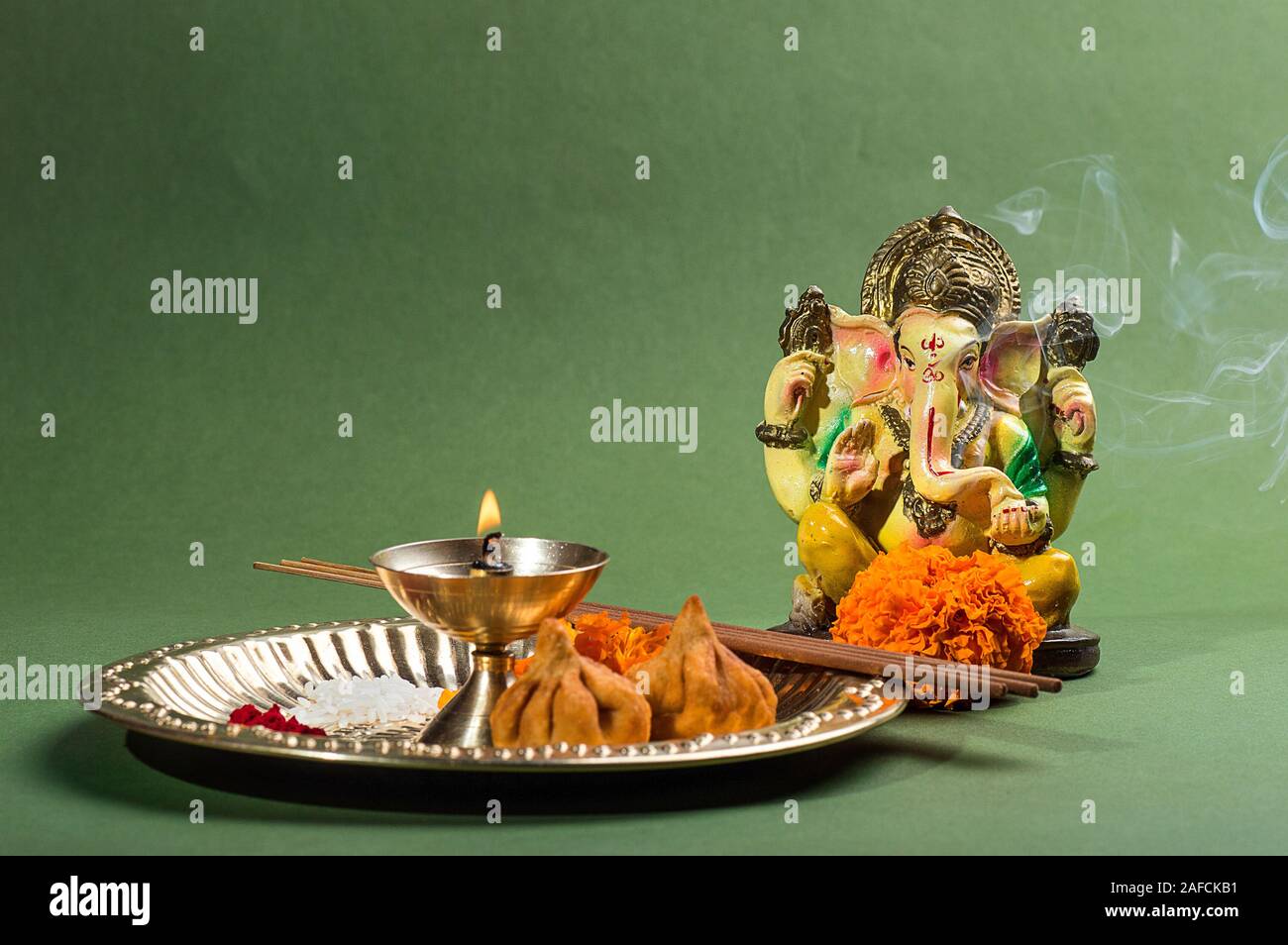 Hindu God Ganesha. Statue of Lord Ganesha. Pooja (Worship) arrangement Stock Photo Alamy