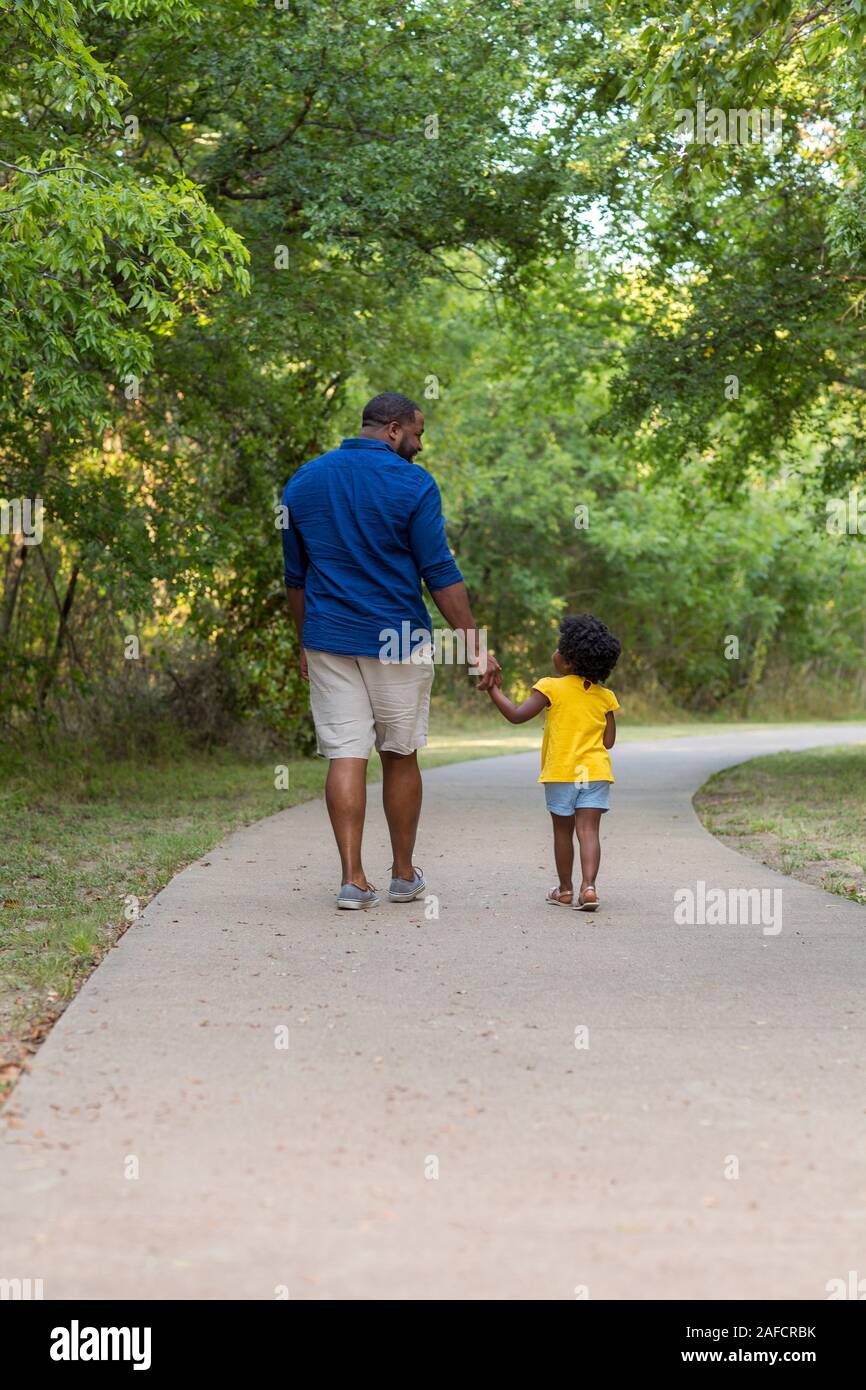 Portrait of an African American father taking a walk. Stock Photo