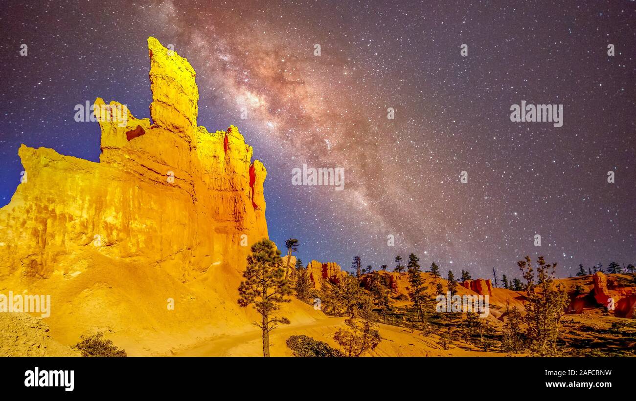 Starry Sky and Milky Way over the Vermilion Colored Hoodoos along the Navajo Trail in Bryce Canyon National Park, Utah, United States Stock Photo