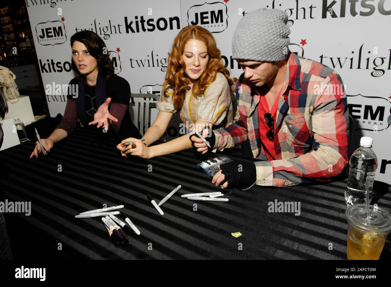 Ashley Greene, Rachelle Lefevre and Kellan Lutz during the 'Twilight' DVD and apparel launch at Kitson in Los Angeles. Stock Photo