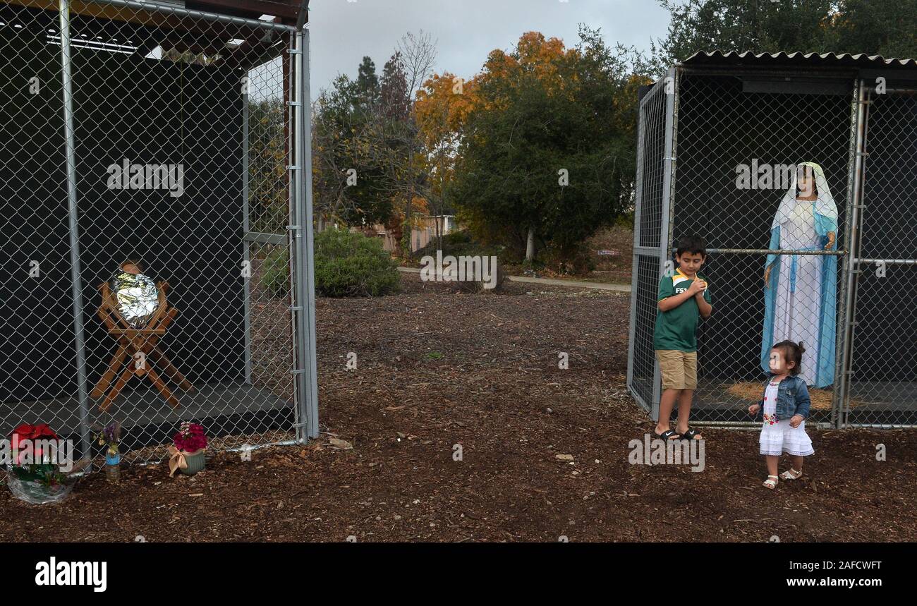 A Nativity scene depicting Jesus, Mary and Joseph as refugees in cages