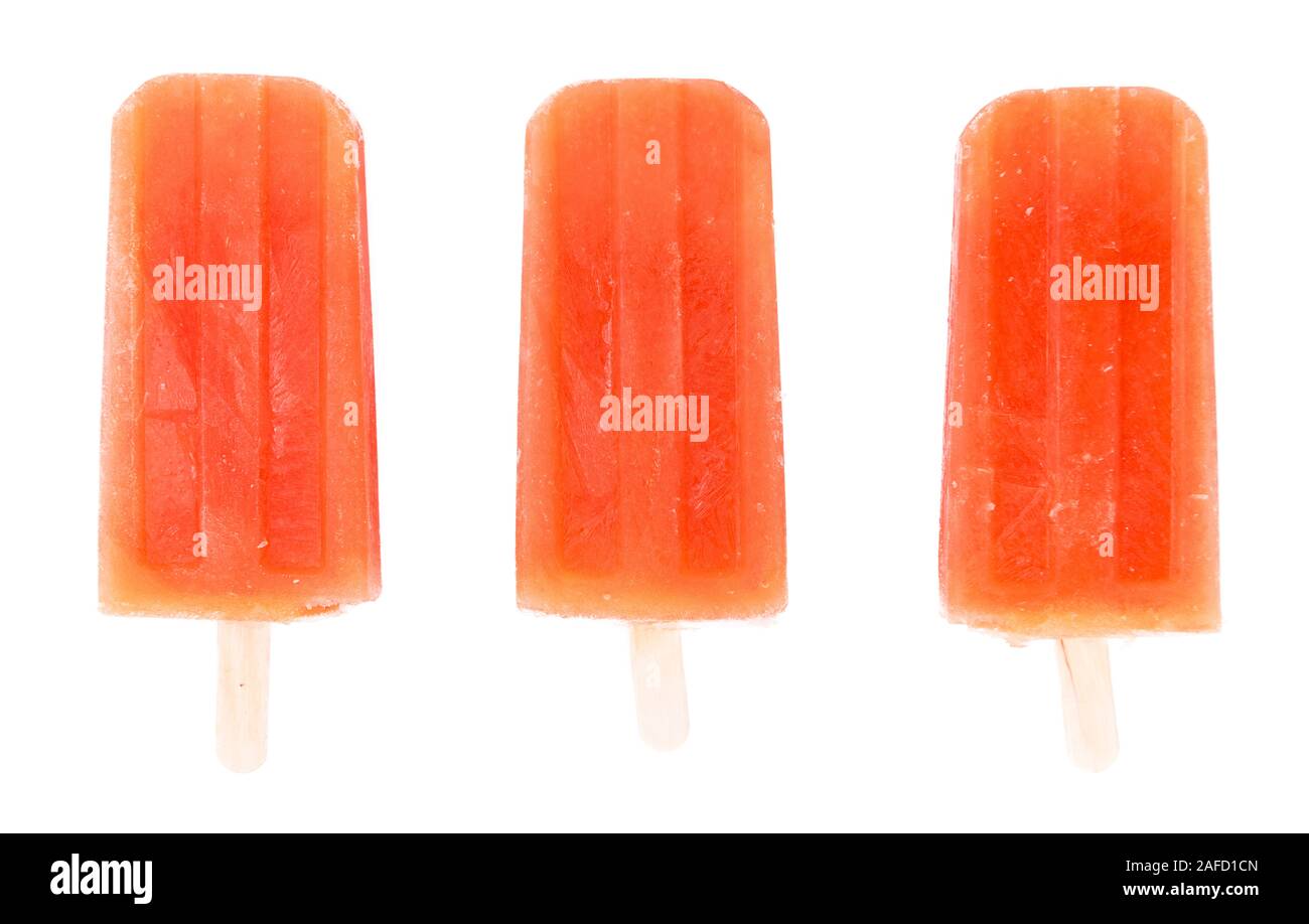 Portion of homemade Grapefruit Popsicles isolated on white background (selective focus) Stock Photo