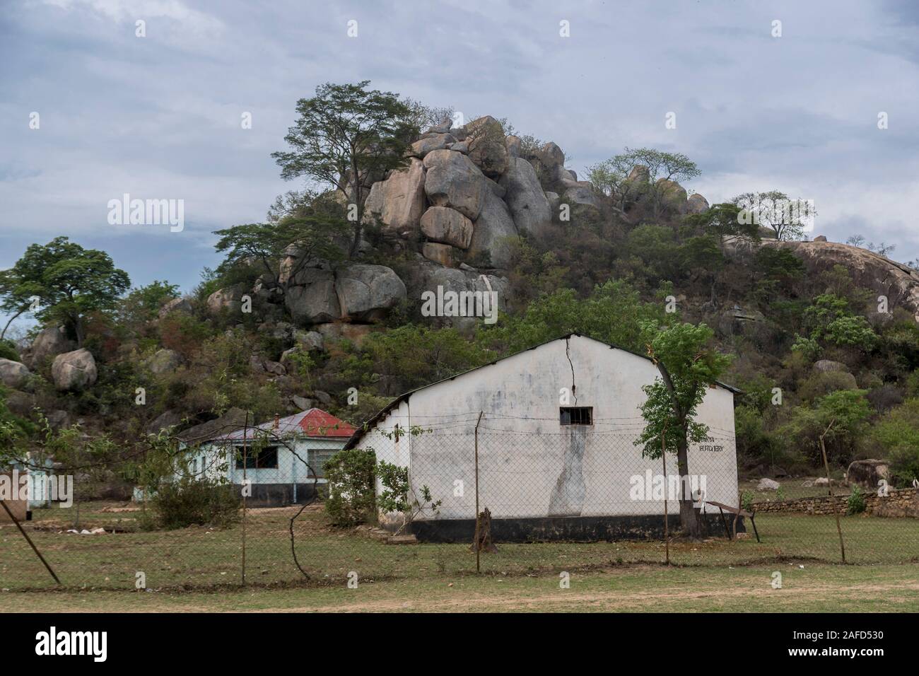 Zimbabwe. Building under a Kopje (Granite hill) in a remote location in centeal zimbabwe. Stock Photo