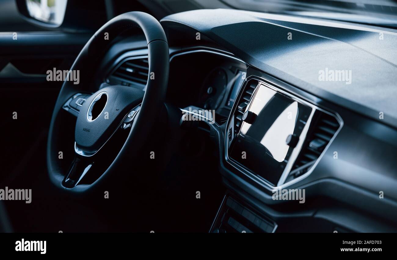 Front panel of luxury new car in the automobile salon. Black interior ...
