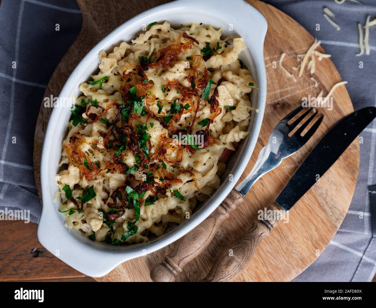 Kaesespaetzle, German cheese noodles with roasted onion Stock Photo Alamy