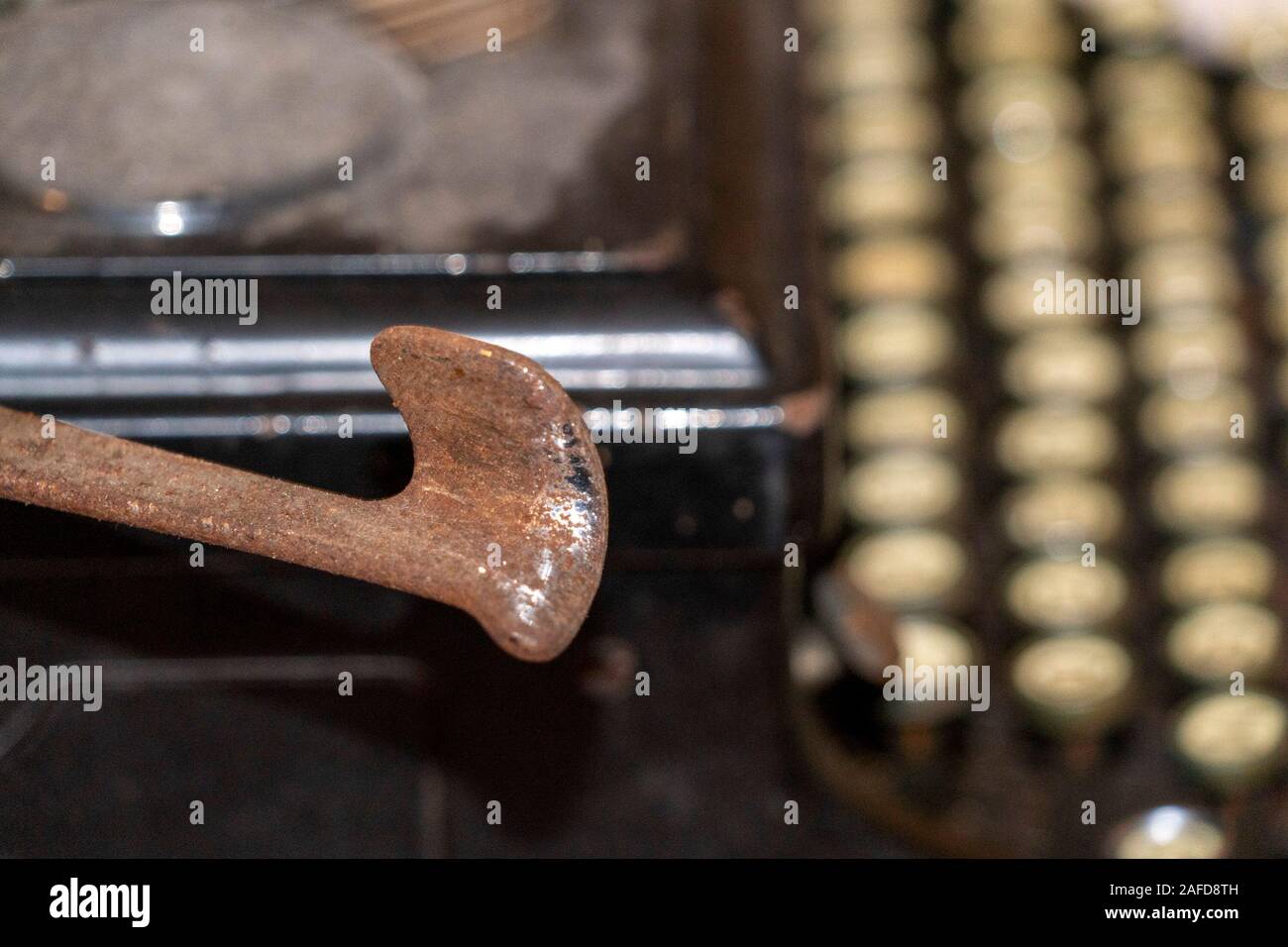 old typewriter rusted and dust covered detail Stock Photo