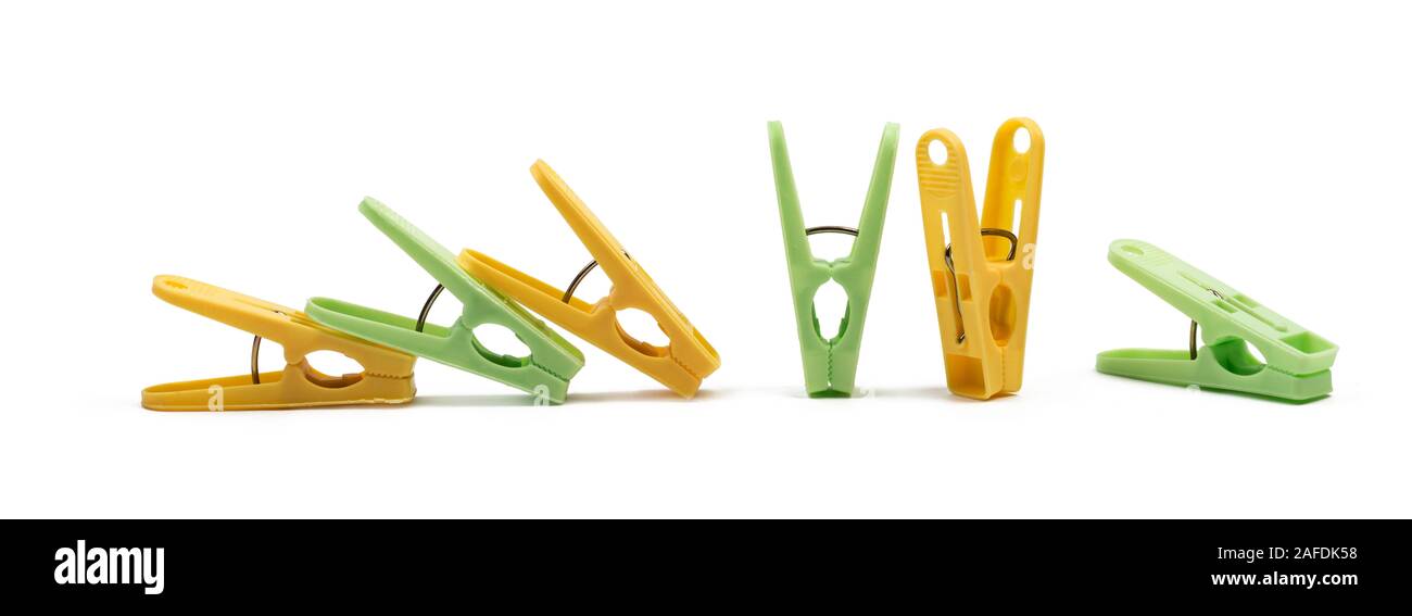 Household clothes pins on white background. Set of color plastic clothespins Stock Photo