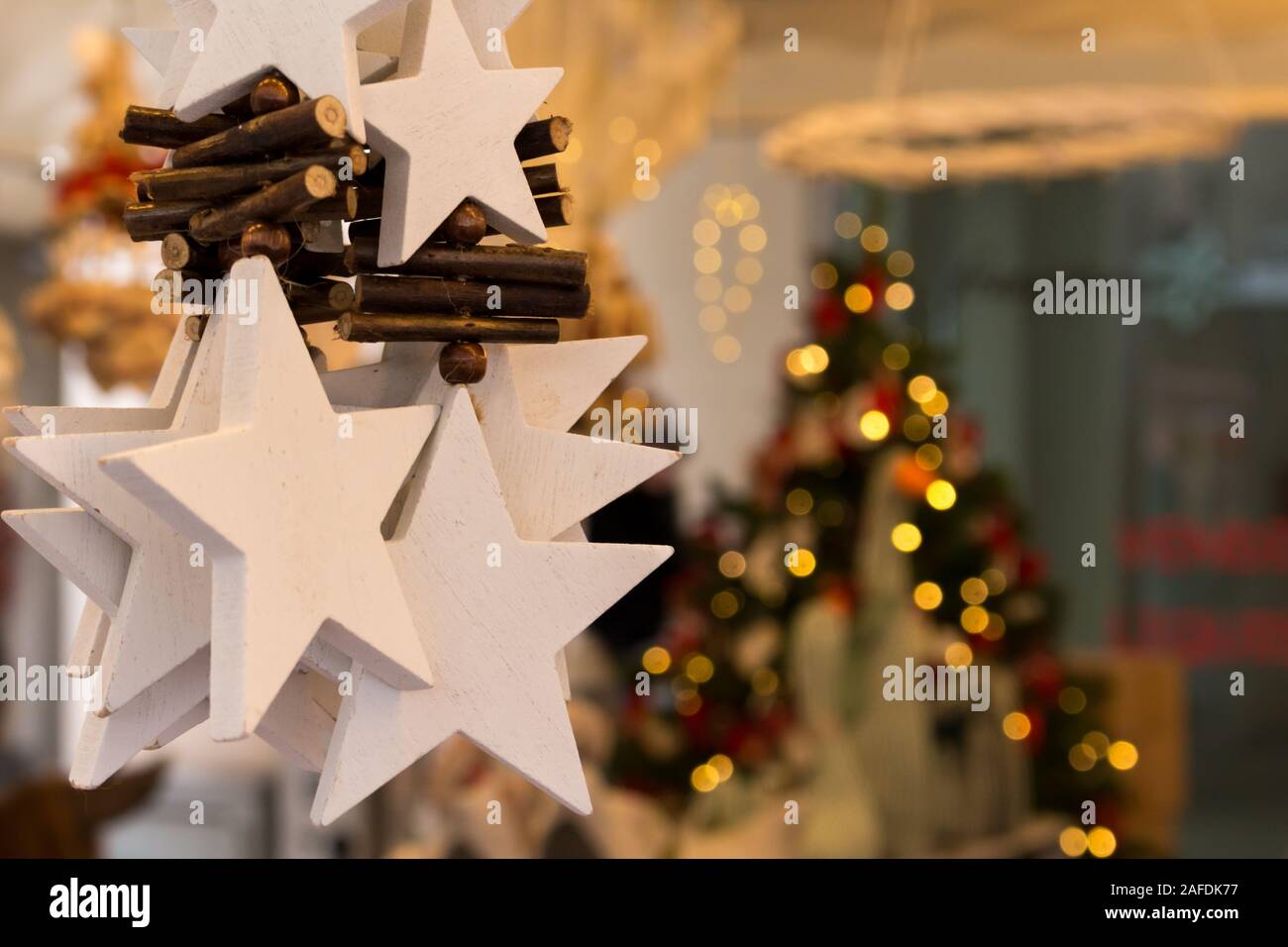 Christmas Decoration With Stars Hanging From The Ceiling And