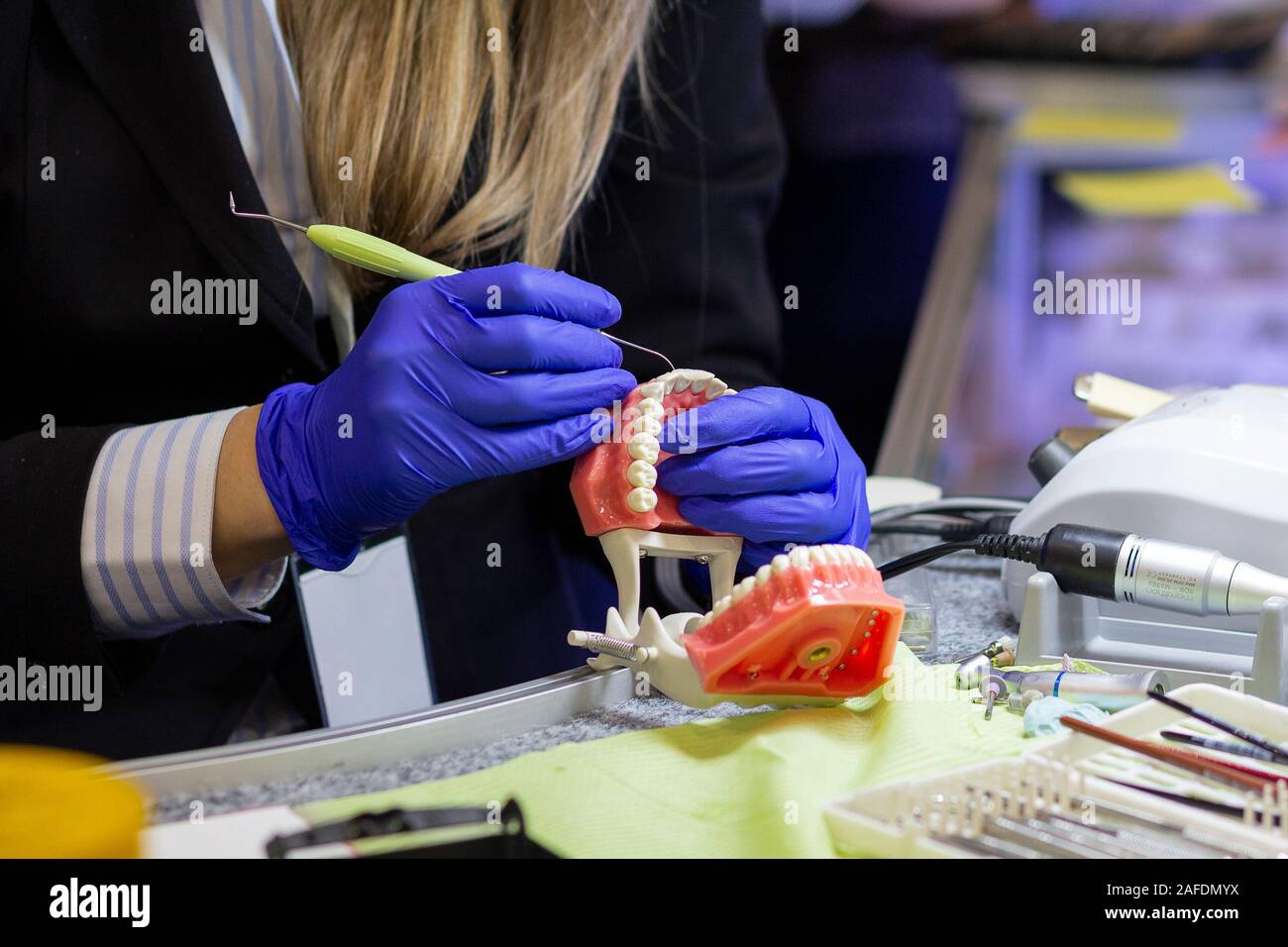 Dental technician or prosthesis worker. prosthetic dentistry process