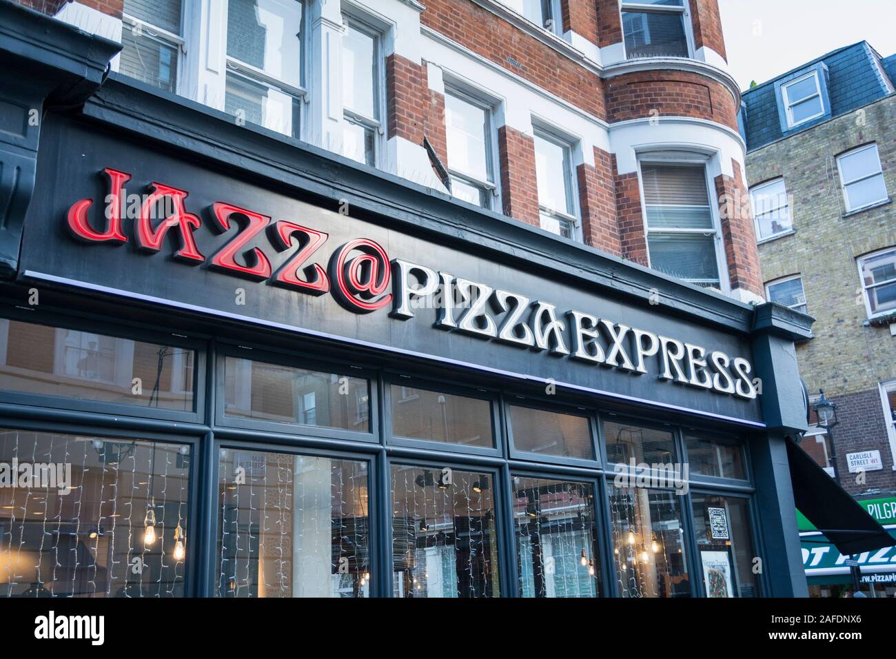 Signage outside Pizza Express Jazz Club, Dean Street, Soho, London, W1