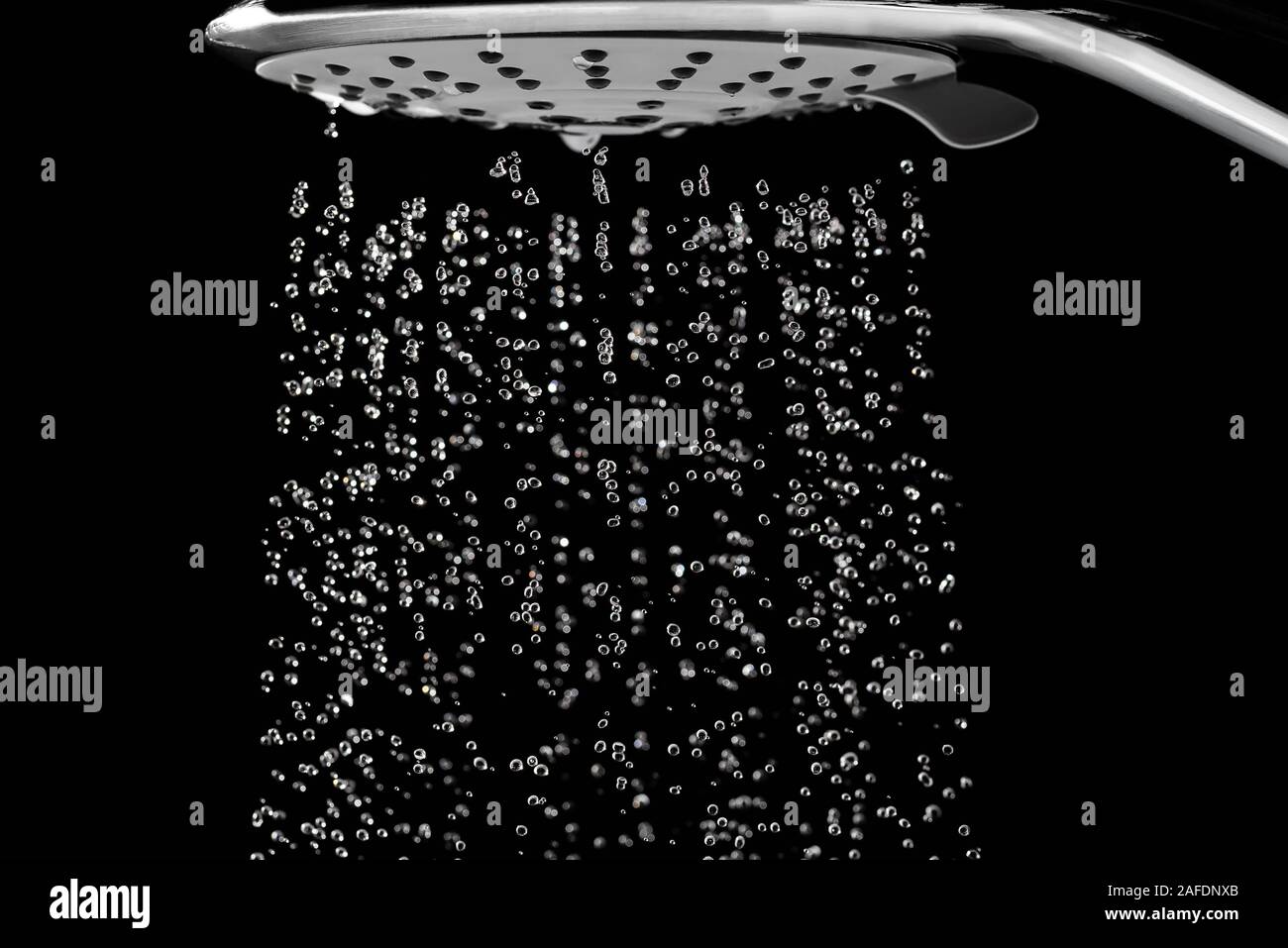 Water spills from the shower. The moment of turning off the water Stock