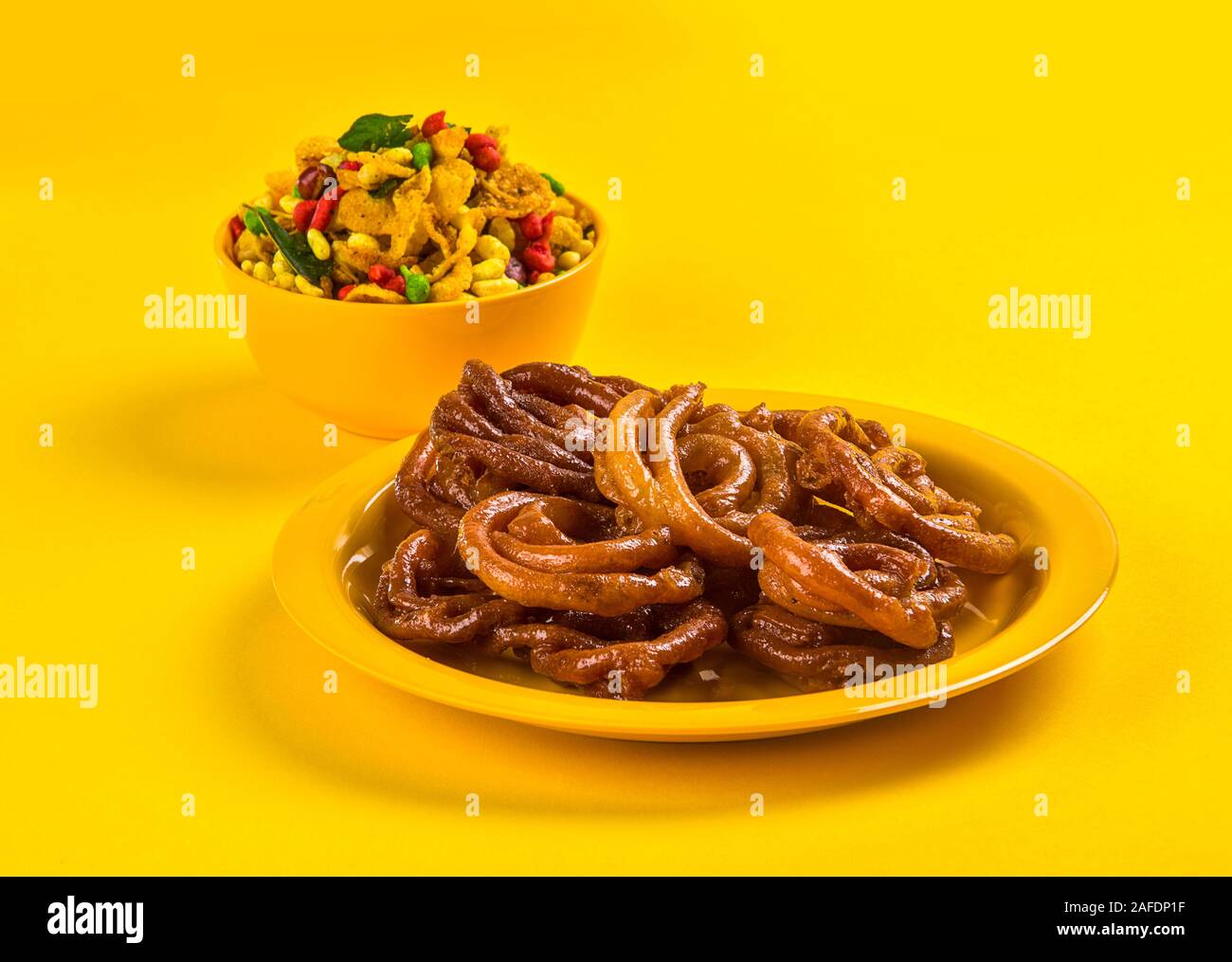 Jalebi and Traditional Indian deep fried salty dish called chivda or