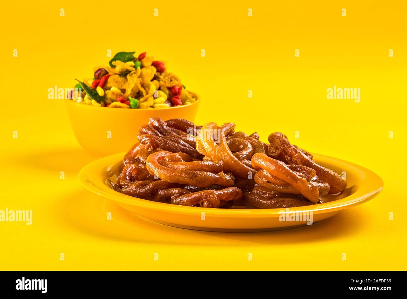 Jalebi and Traditional Indian deep fried salty dish called chivda or