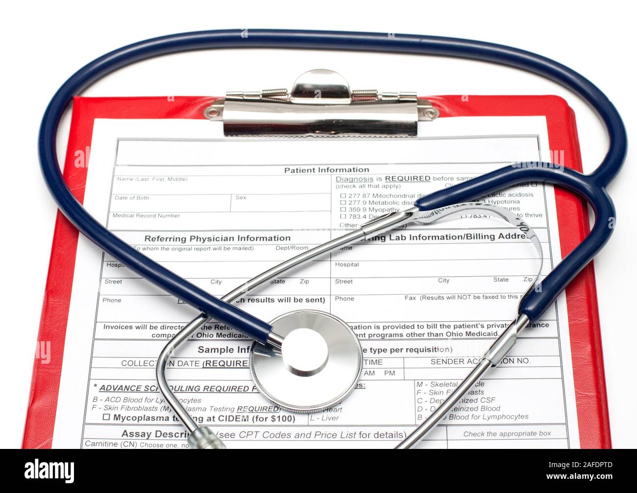 Blank Patient information on red clipboard with stethoscope on white background Stock Photo