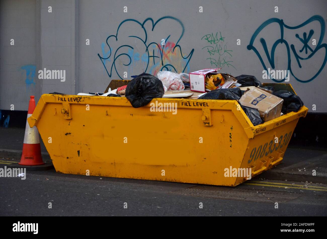 rubbish in a skip Stock Photo Alamy