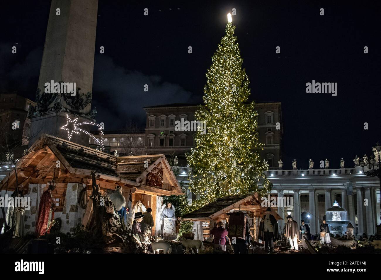 Rome Italy 8 December 19 In Piazza San Pietro The Nativity Scene Reproduced With The Wood Of Trentino With The Christmas Tree In The Background Stock Photo Alamy