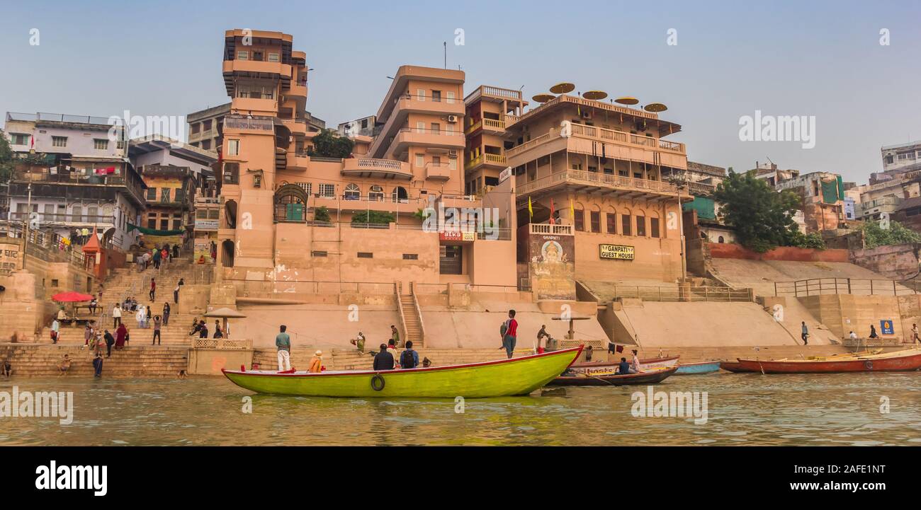 Panorama of colorful boats at the Meer Ghat in Varanasi, India Stock Photo