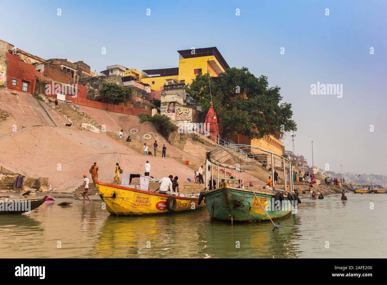 Colorful boats at the Ganges river in Varanasi, india Stock Photo
