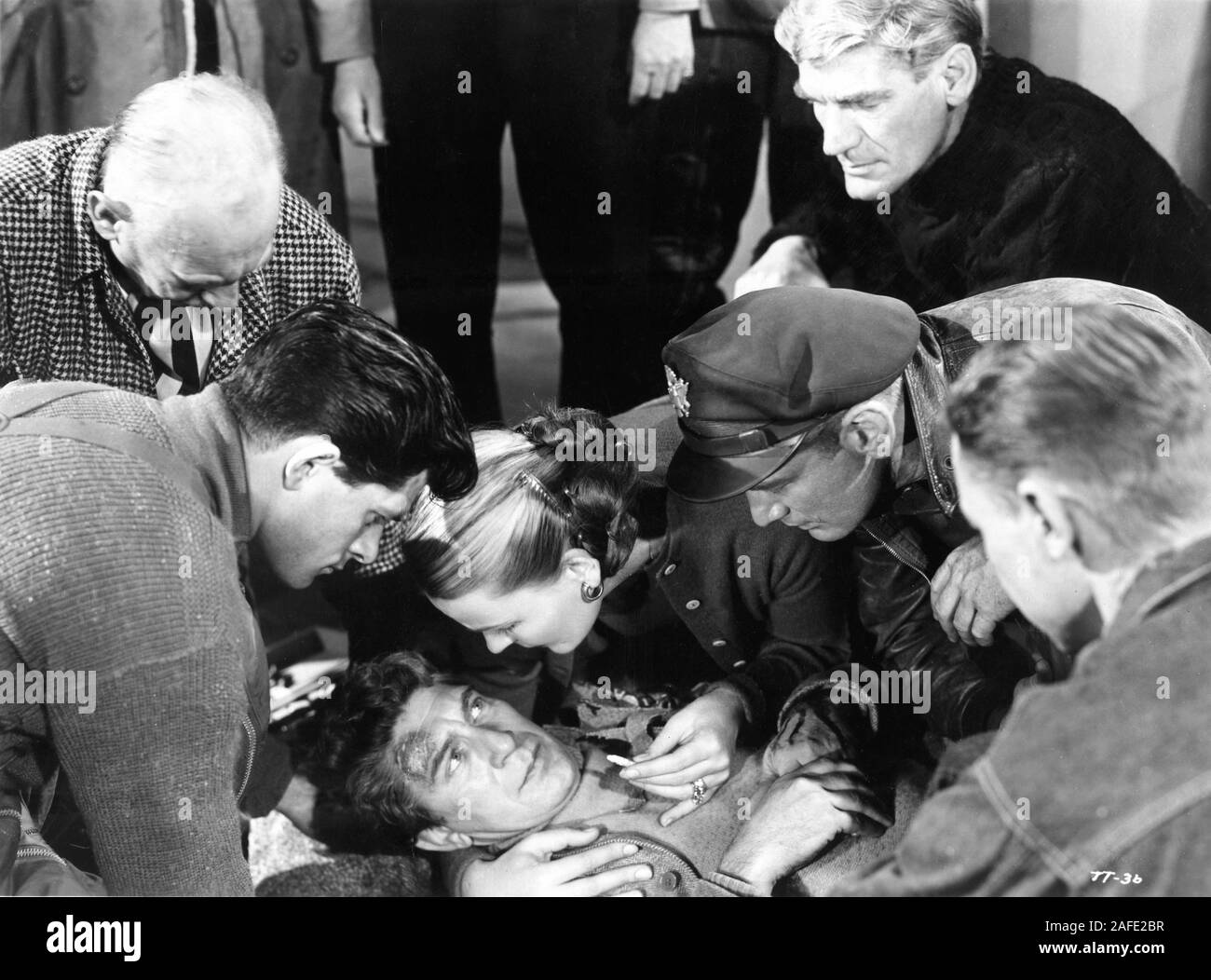 DEWEY MARTIN KENNETH TOBEY and JOHN DIERKES in THE THING From Another World 1951 directors Christian Nyby and Howard Hawks screenplay Charles Lederer producer Howard Hawks Winchester Pictures Corporation / RKO Radio Pictures Stock Photo