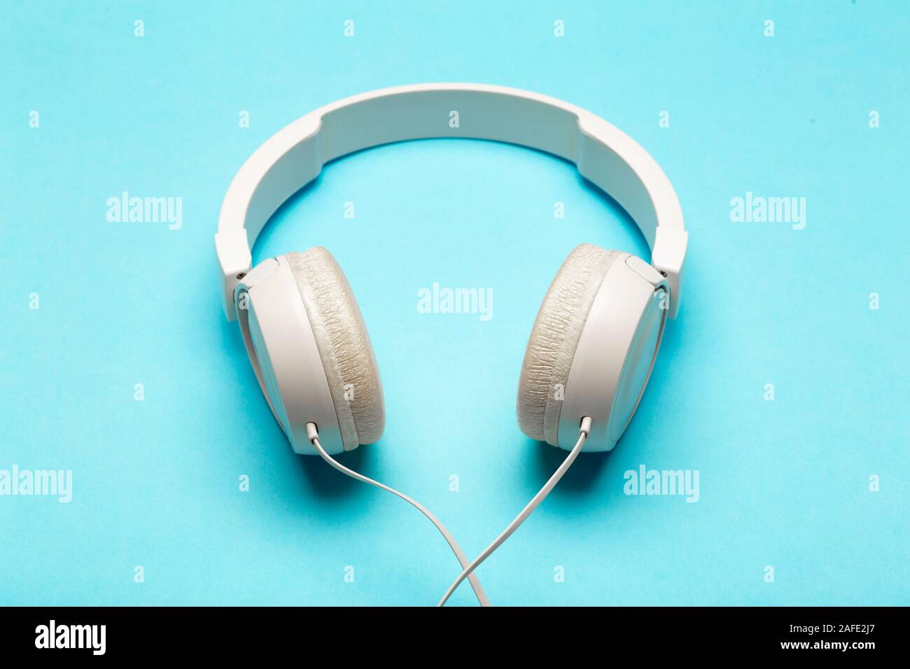 Musical Headphones On A Colored Blue Background Aesthetics Retro 80s And Minimal Concept Stock Photo Alamy