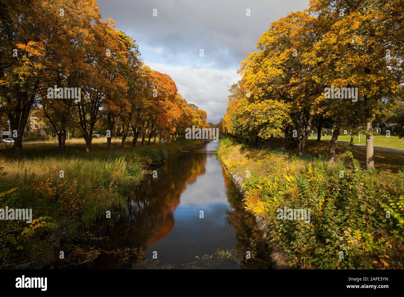 TORSHÄLLA stream in landscape with autumn color Stock Photo