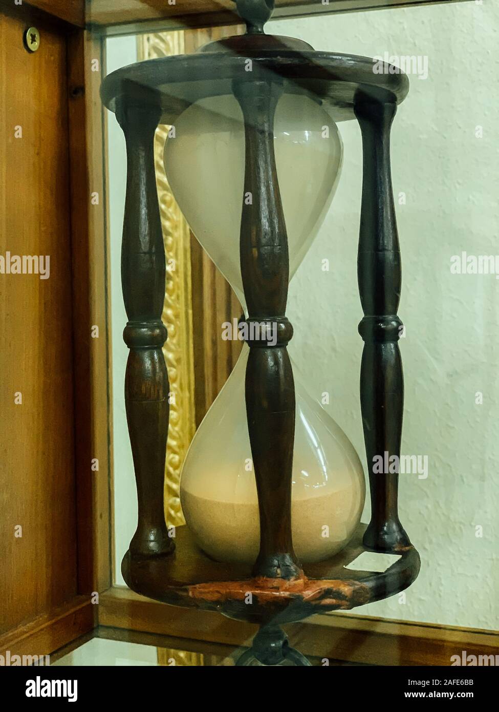 old vintage hourglass to check time clock Stock Photo Alamy