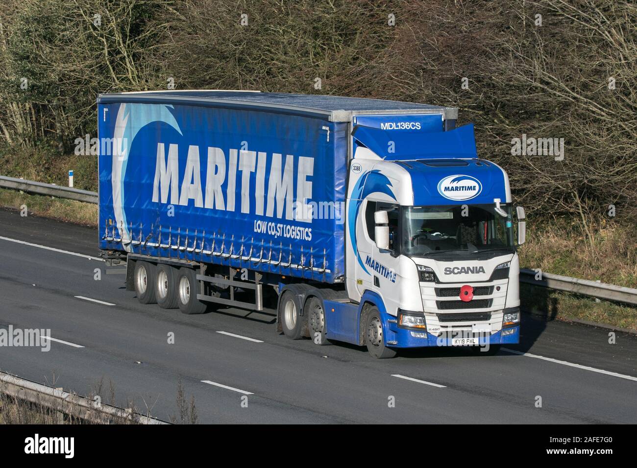 MARITIME Haulage delivery trucks, lorry, transportation, truck, cargo carrier, vehicle, European commercial transport, industry, M61 at Manchester, UK Stock Photo