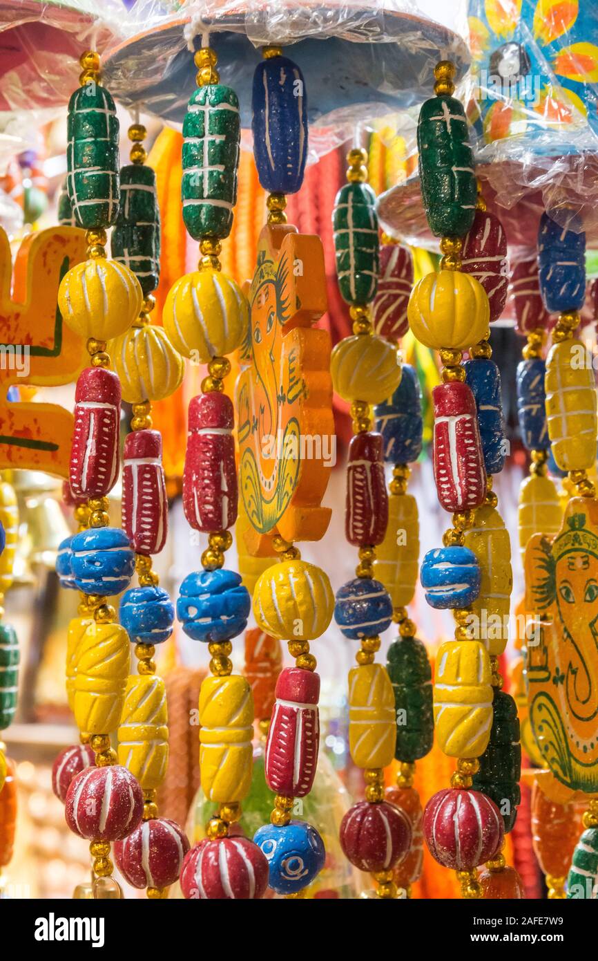 Colorful souvenirs on a market in Varanasi, india Stock Photo