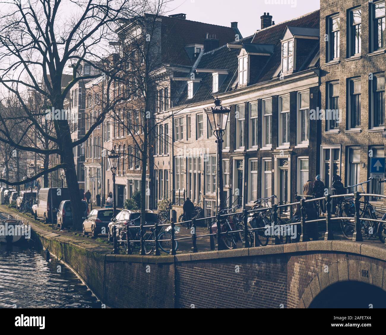 Amsterdam autumn in the morning, old city centre, bridge, canals of Amsterdam Stock Photo