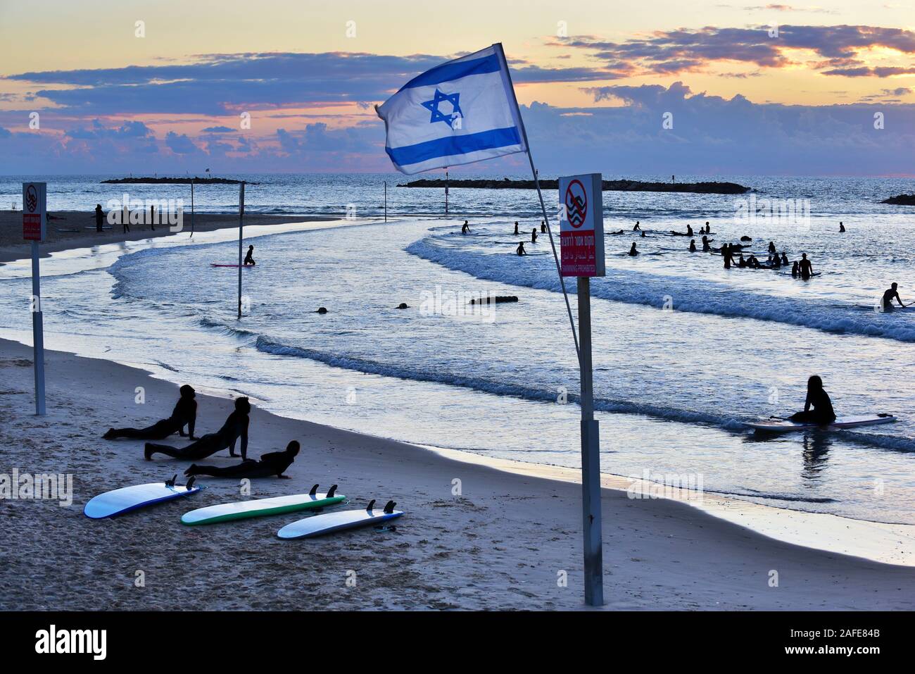 Sunset on the beach of Tel Aviv Stock Photo