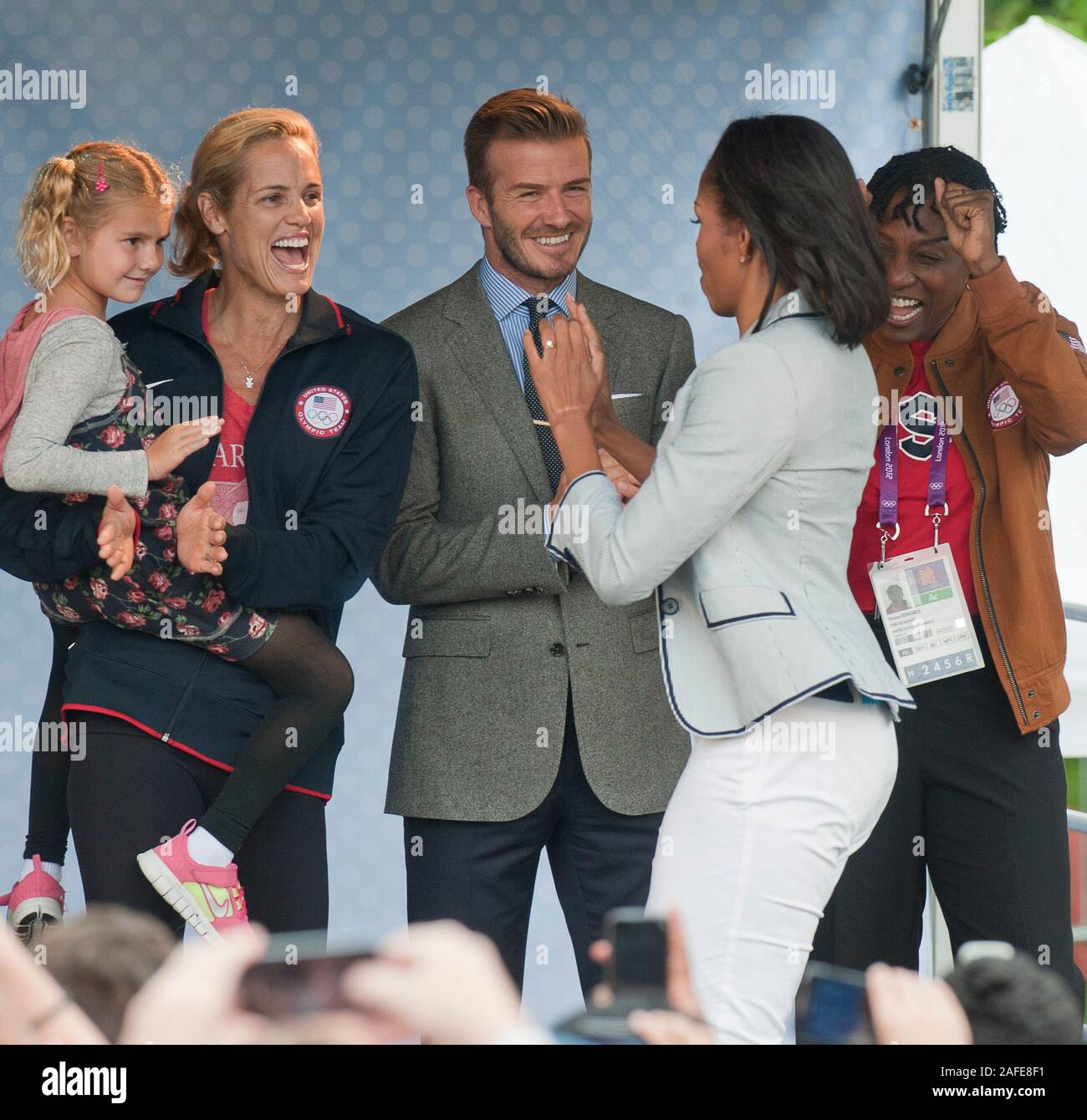 Wearing a patriotic outfit America's first Lady Michelle Obama attending a party for 'Let's move' campaign at Winfield House, The U.S. Ambassador's residence in London ahead of  the Olympic Games being held in the U.K. Stock Photo