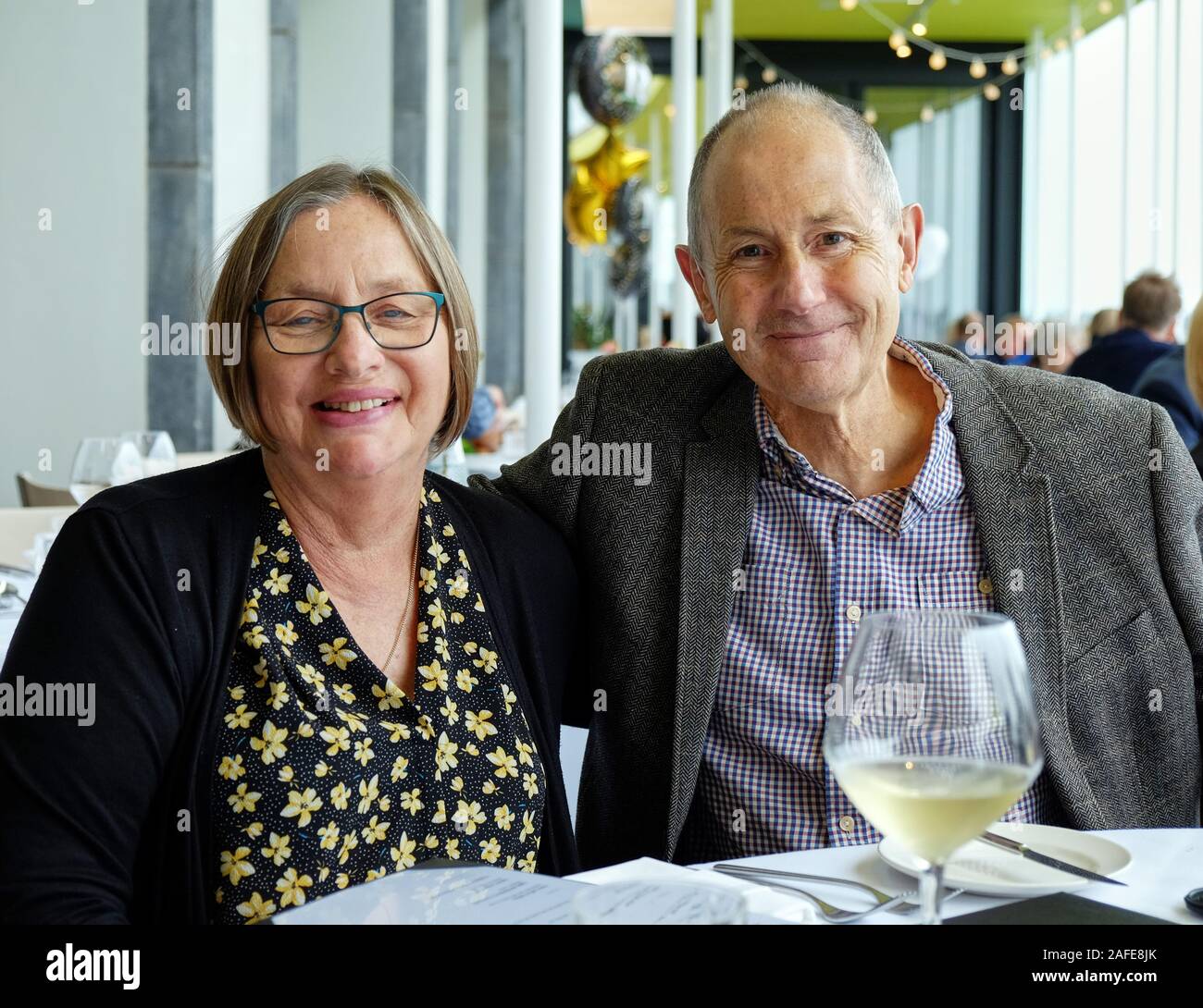 Middle age couple (seniors) dining out and having fun Stock Photo