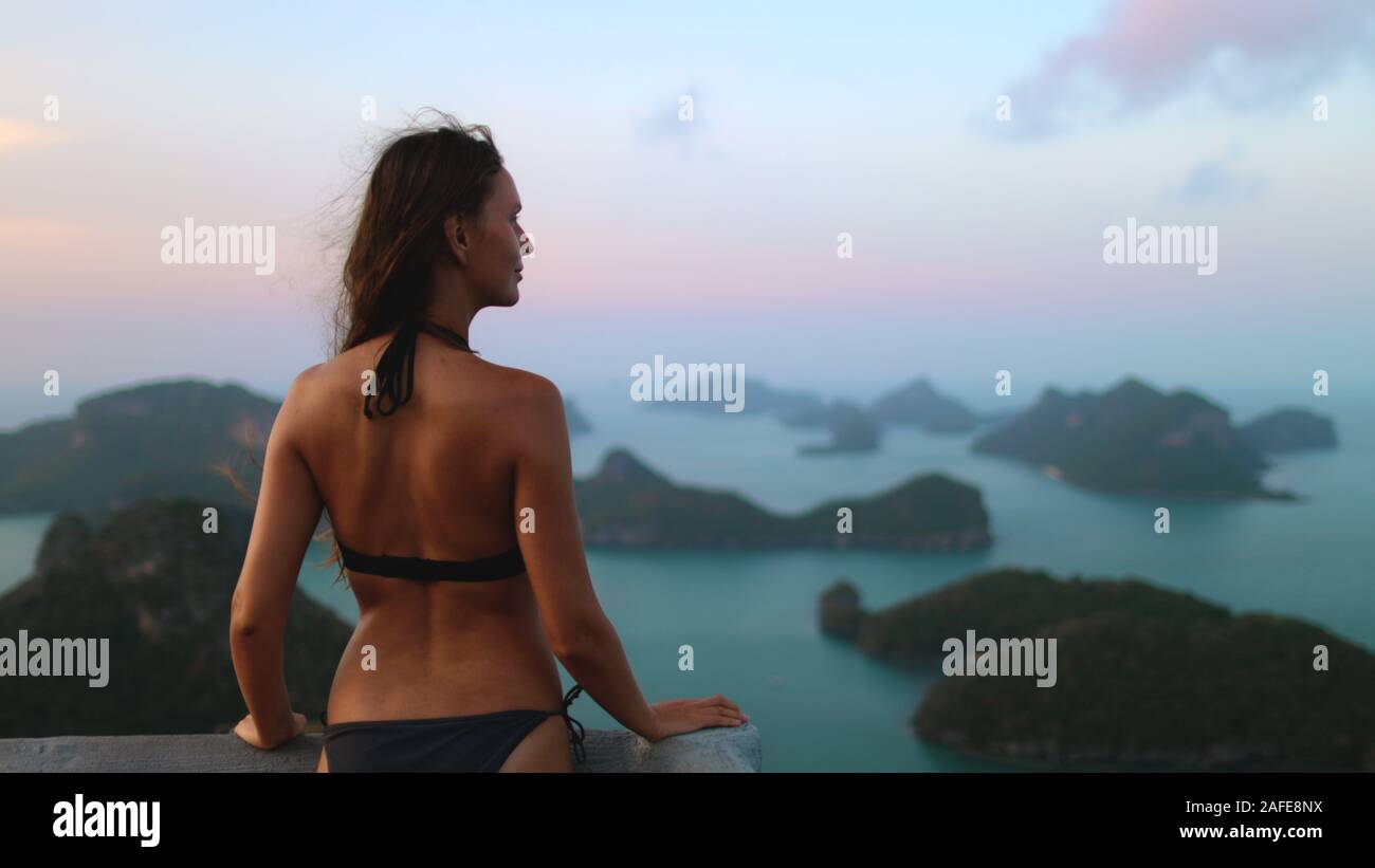 Woman Back View Ang Thong National Marine Park. Caucasian Young Girl in Bikini to Exotic Asian Island. Female Traveler Enjoy Solitude Vacation. Stock Photo