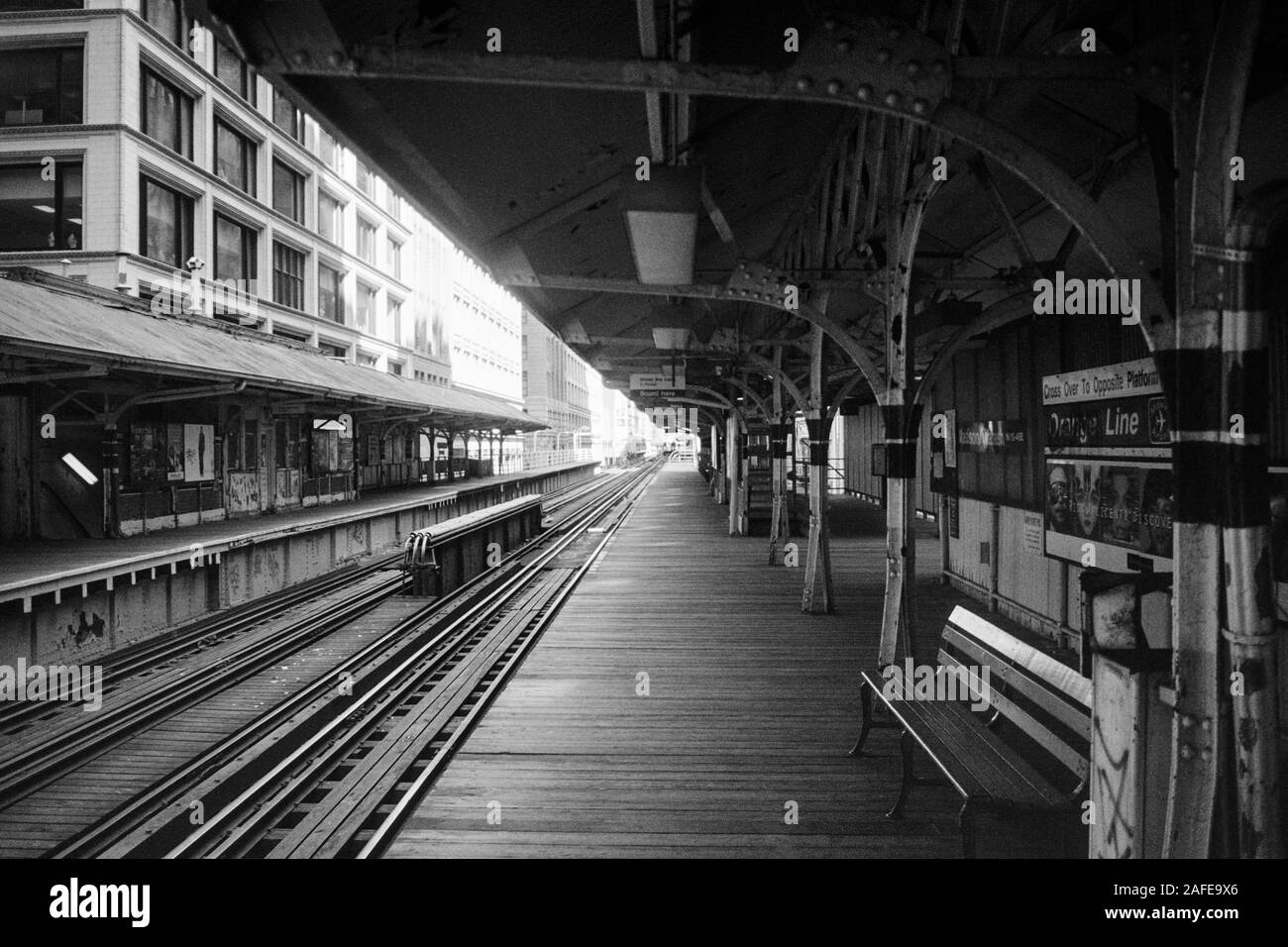 Chicago, Illinois, USA - 1996:  Archival black and white view of  the Madison Wasbash elevated train platform.  The station was torn down in 2015. Stock Photo