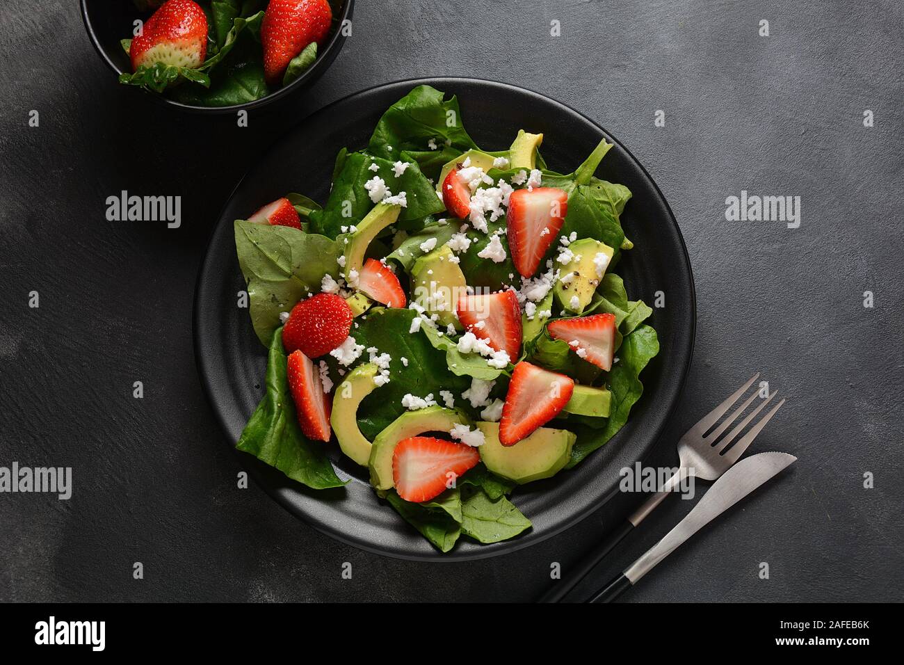 Summer Strawberry Salad With Spinach Feta Cheese Avocado Balsamic Vinegar And Olive Oil In A Plate Vegan Food Healthy Food Concept Stock Photo Alamy