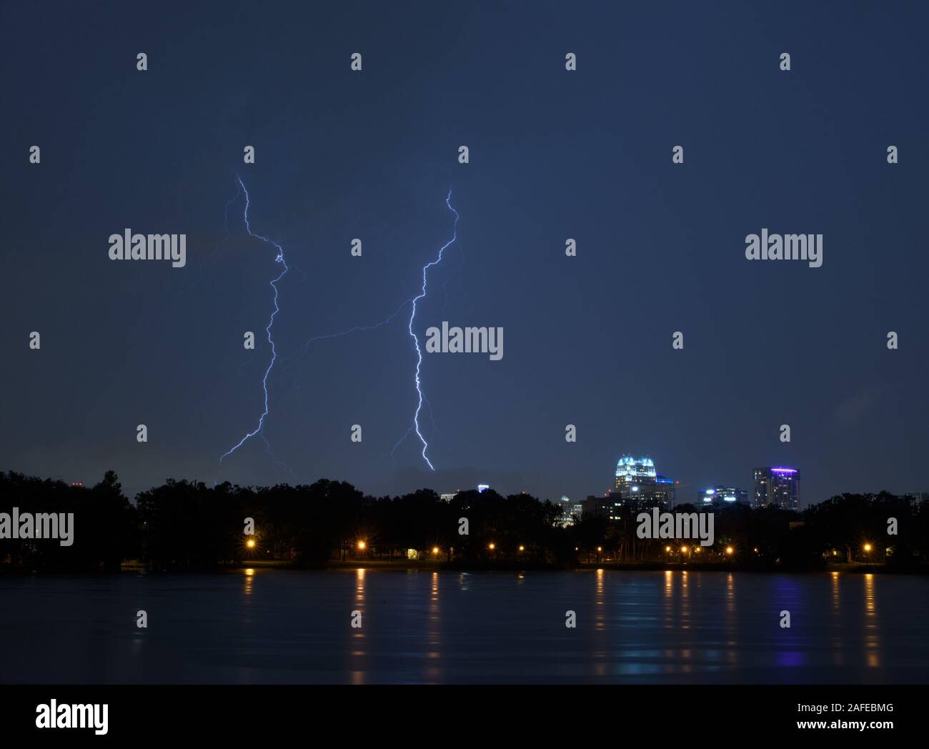 Lightning during a summer thunderstorm over downtown Orlando, Florida. Stock Photo