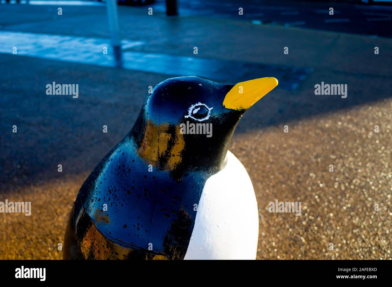Head detail of a statue of penguins on seaside promenade at Redcar Cleveland UK Stock Photo