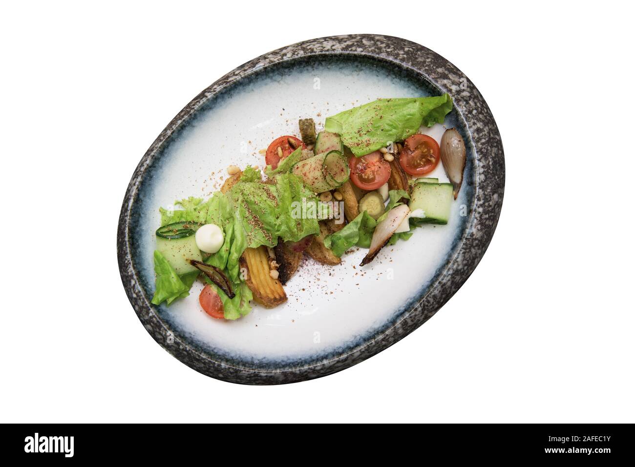 Salad With Fried Potato Lettuce Pickled Cucumbers And Tomatoes On