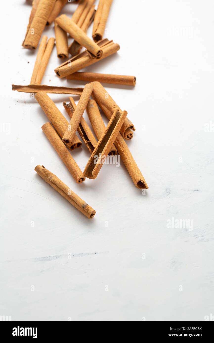 Cinnamon sticks on white background Stock Photo Alamy