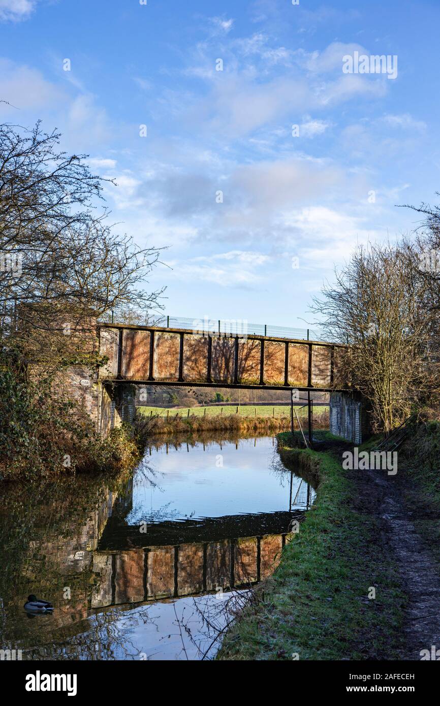 Disused railway bridge 151A, over Trent and Mersey canal now part of Wheelock Rail Trail, Cheshire UK Stock Photo