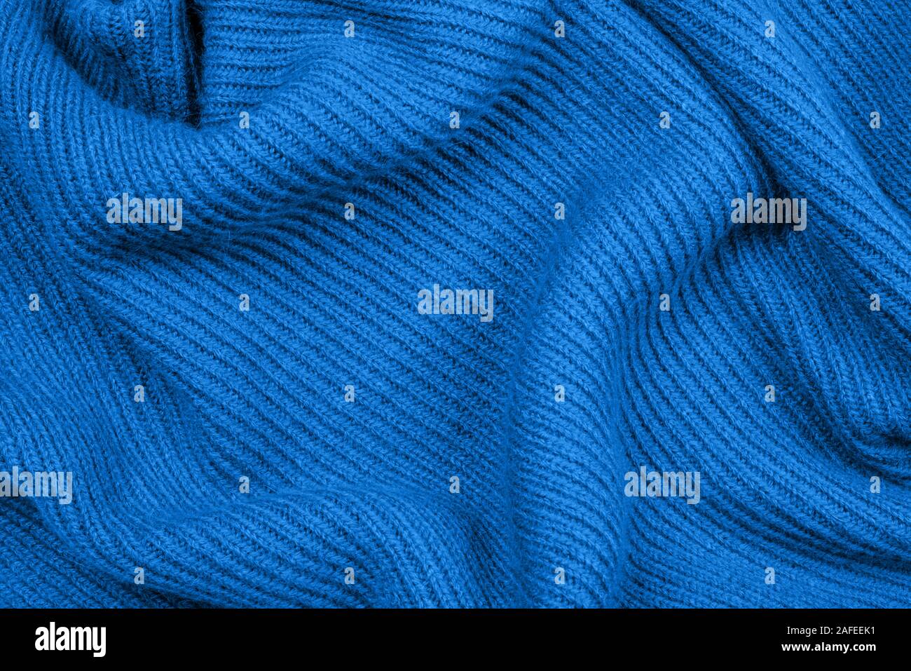 Blue knitted fabric texture for your background. Stock Photo