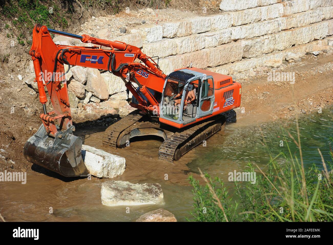 Valdagno, Northern Italy, Italy - August, 31, 2015 - method for river banks consolidation and for protection of lands against water flooding Stock Photo